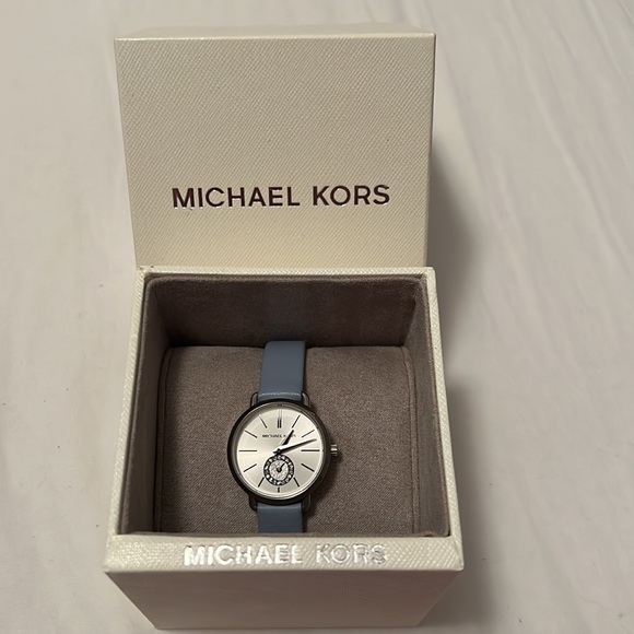 Almost New. Michael Kors Watch. Leather baby blue adjustable strap.